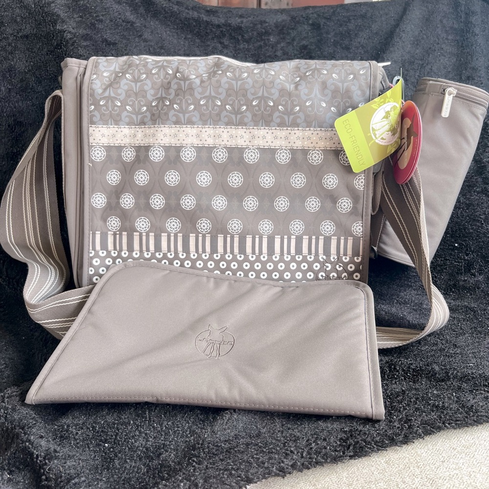 Lassig NWT Diaper Bag. Comes with bottle holder and changing pad.